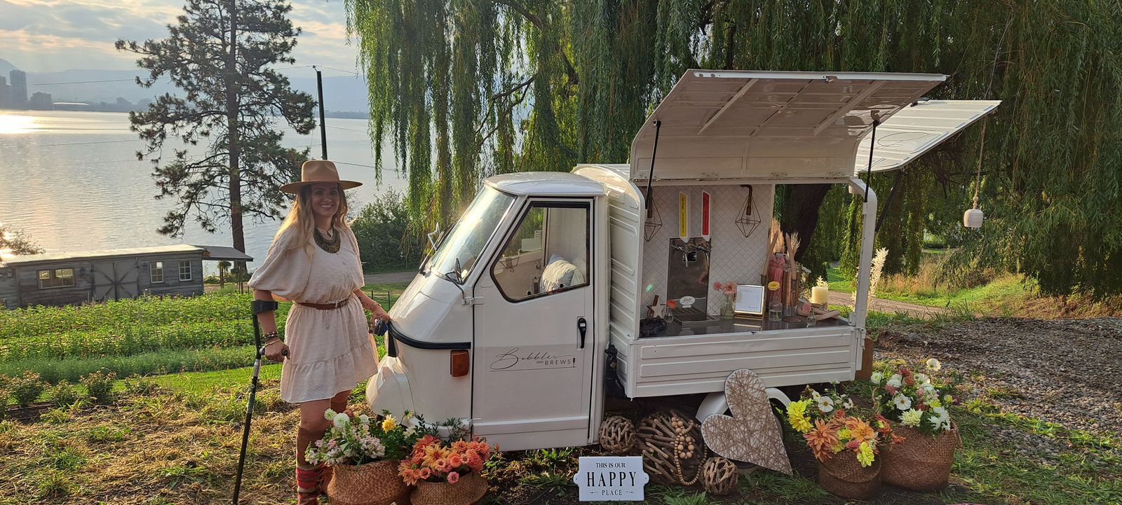 Sunrise portrait beside the mobile bar at the Farm Event venue overlooking Okanagan Lake