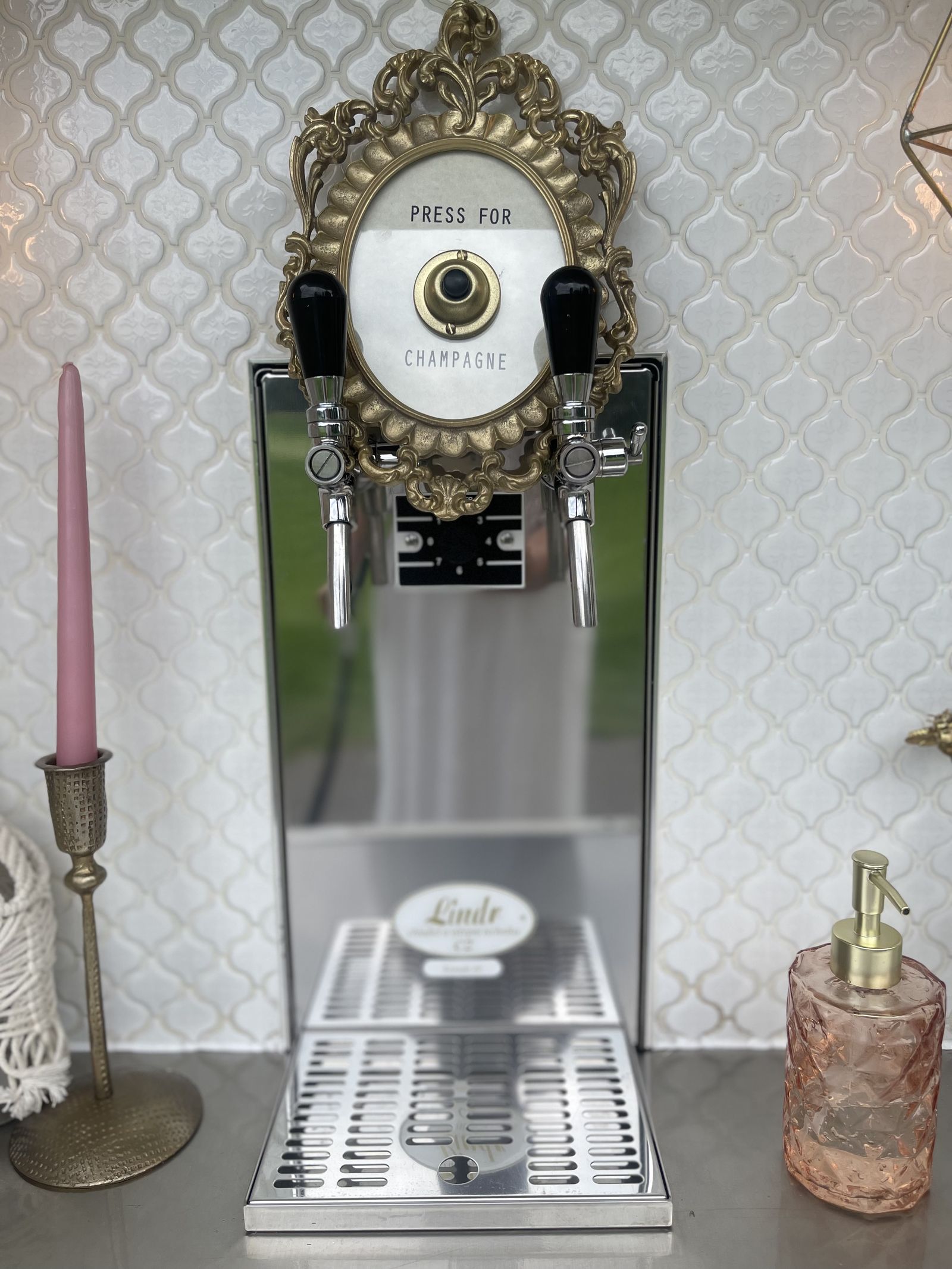 Bubbles and Brews vintage mobile bar parked at a forested Alberta event venue