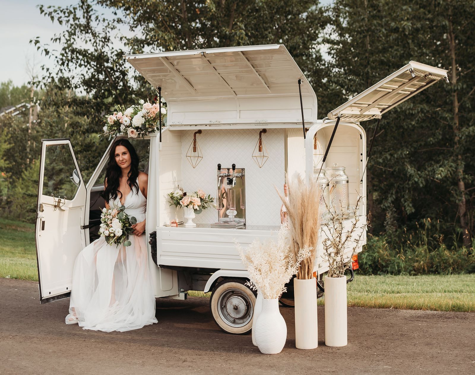 Bride seated in the cab of the Calgary prosecco truck, professional wedding photography