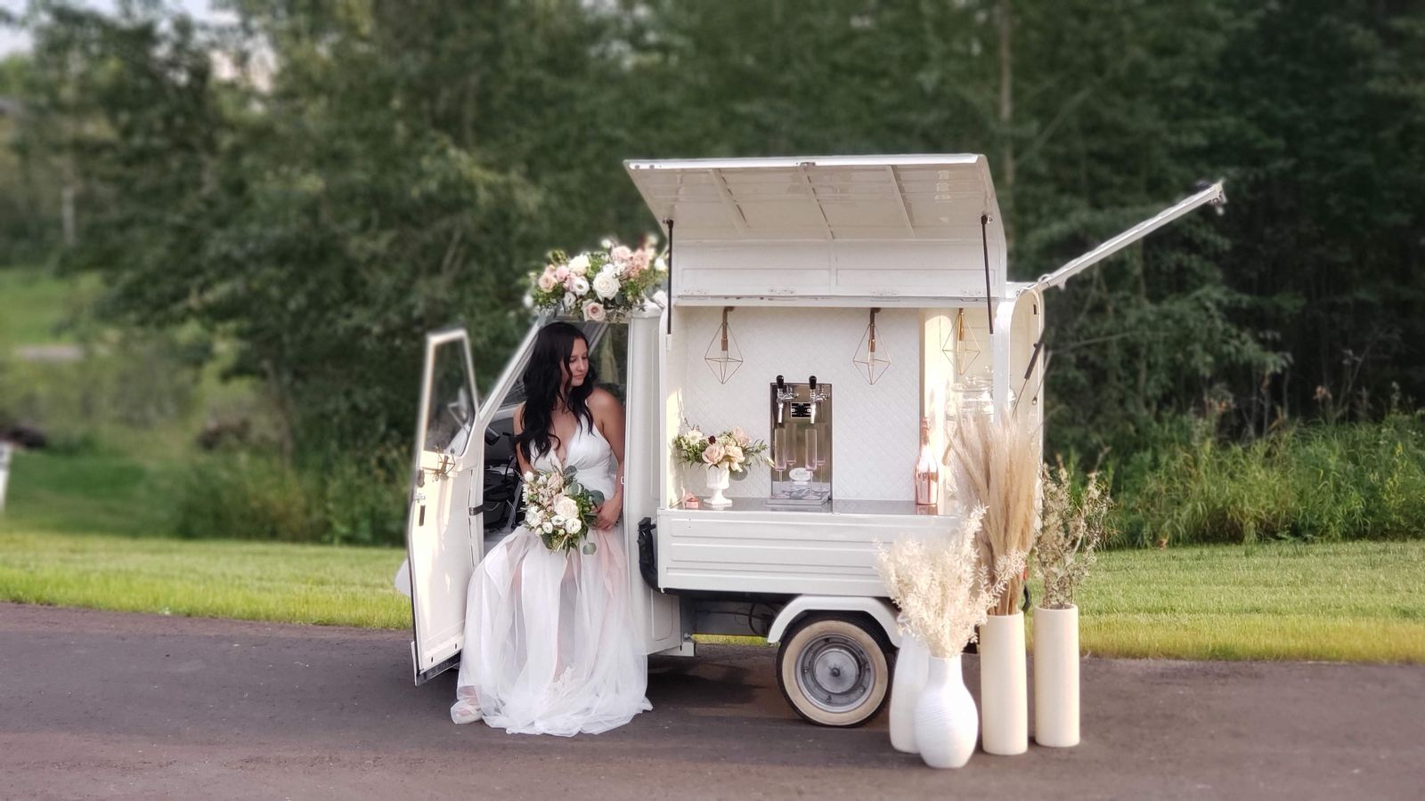 Professional wedding photography of a bride beside the Bubbles and Brews Calgary mobile bar