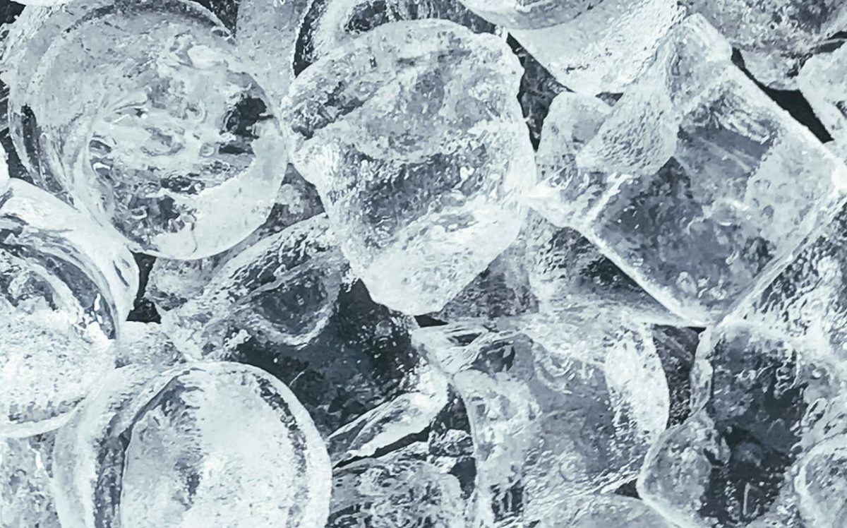Close-up of clear ice cubes, illustrating the Bubbles and Brews ice calculator tool